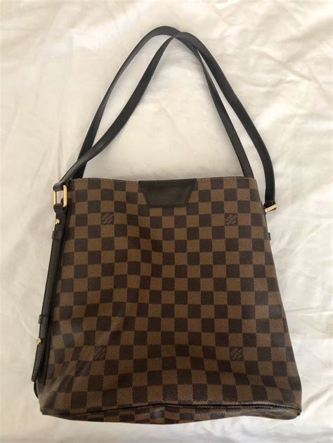 louis vuitton coated fabric cowhide leather trim man made lining|louis vuitton handbags interior lining.